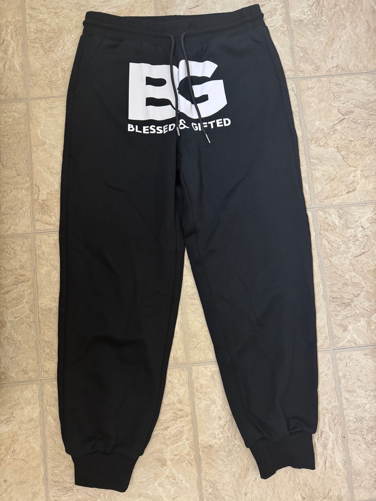Oversized “QUITTING ISN’T AN OPTION” jogger pants